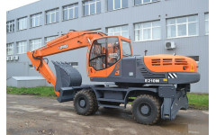 Аренда колесного экскаватора UMG E230W с грейфером