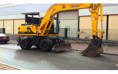 Аренда колесного экскаватора JCB JS 175W с грейфером