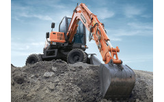 Аренда колесного экскаватора DOOSAN DX55W с грейфером Аренда колесного экскаватора DOOSAN DX55W с грейфером