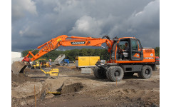 Аренда колесного экскаватора DOOSAN DX160W с грейфером
